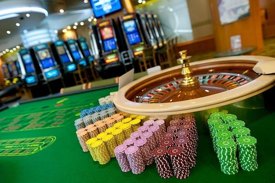 Glowing botanical panel beside video poker notes